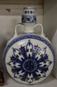 A Chinese blue and white moon flask.