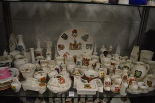 A collection of Goss and other crested china.