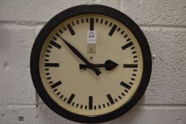 A Siemens wall clock.
