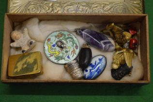 A box containing miscellaneous collectables.