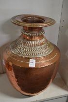 A large Eastern copper vessel.