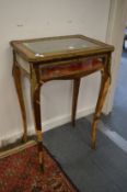 A 19th century French rosewood and ormolu mounted small vitrine table (faults).
