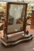 A Victorian mahogany dressing table mirror.