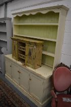 A large painted pine dresser.