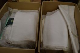 Four boxes of white table linen etc.