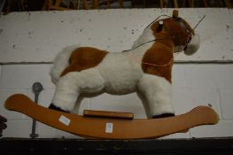 A small rocking horse.