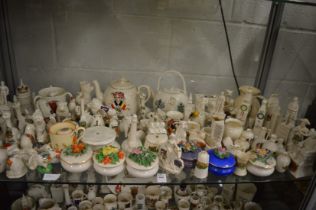 A collection of Goss and other crested china.