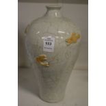 A Chinese crackle glaze vase decorated with fish.