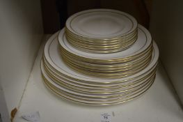 A collection of Royal Worcester Contessa plates and a boxed set of decorative champagne glasses.