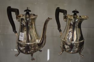 A Sheffield silver coffee pot with matching hot water jug.