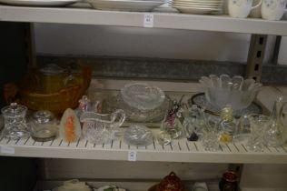 A shelf of glassware.