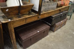 A French farmhouse dining table with two drawers.