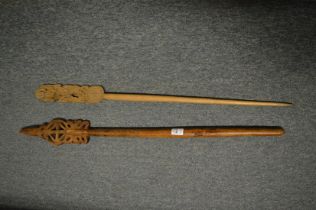 Two carved wood staff's or pointers.