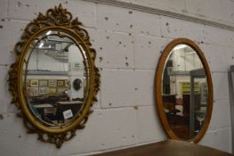 Two oval mirrors.