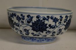 A Chinese blue and white circular bowl.