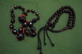 A cherry amber style bead necklace.