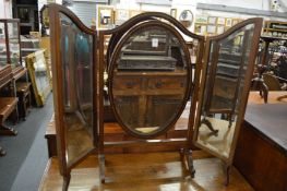 An Edwardian mahogany folding dressing table mirror.