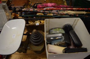 Weighing scales, walking sticks and other items.
