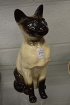 A large Beswick model of a Siamese cat.