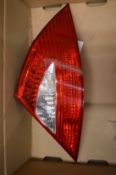 A rear light unit for the drivers side of a Mercedes CLS500 car year 2005.