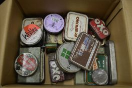 A collection of old tins and ephemera relating to World War 2.