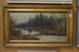 T Wood, Wooded river landscape, oil on canvas, signed.