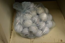A bag of fifty assorted golf balls.