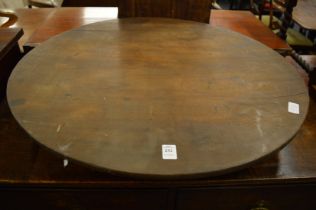 A mahogany circular bird cage table top.