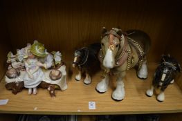 Models of Shire horses and a porcelain figural inkwell.
