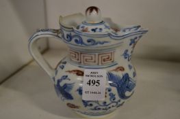 A small Chinese ewer and cover.