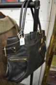 A black leather handbag.