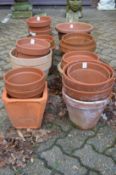 A quantity of terracotta plant pots.