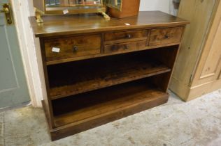 A hardwood storage unit with open shelves.