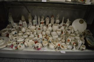 A collection of Goss and other crested china.