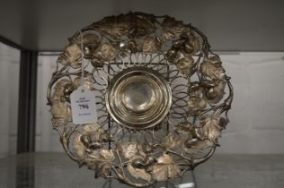 Silver plated dish with leaf cast border.