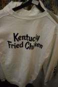 A KFC finger lickin' good hoodie together with two similar sweat shirts.