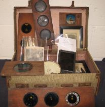 PHOTOGRAPHY: a small suitcase of magic lantern slides, some in wooden frames, four small framed