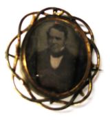 [PHOTOGRAPHS] 2 x daguerreotype portrait photographs of men, ca. 1850, mounted as jewellery /