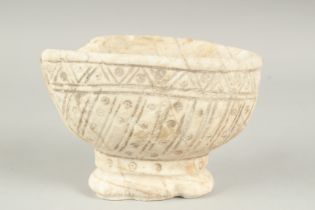 A RARE 11TH - 12TH CENTURY POSSIBLY ANDLUSIAN ALMOHAD SPANISH CARVED WHITE MARBLE FOOTED BOWL, 19.