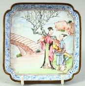 A CHINESE SQUARE FORM ENAMELLED DISH, painted with two female figures in a garden, 10cm sqaure.