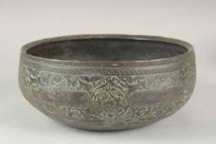 A FINE 16TH-17TH CENTURY PERSIAN SAFAVID ENGRAVED BRONZE BOWL, 23cm diameter.