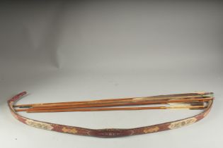 AN OTTOMAN TURKISH BOW WITH FIVE ARROWS.