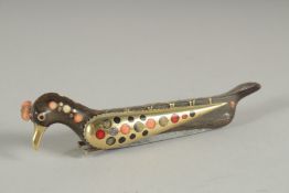 A FINE CORAL AND BONE INLAID RHINO HORN BIRD-FORM FOLDING KNIFE, with brass mounts and inset with