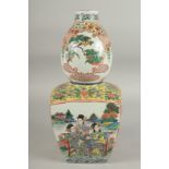 A CHINESE FAMILLE ROSE PORCELAIN VASE, with character mark to base, 34cm high.