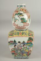 A CHINESE FAMILLE ROSE PORCELAIN VASE, with character mark to base, 34cm high.