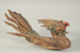 A FINELY CARVED 19TH CENTURY BURMESE POLYCHROMED WOOD PHOENIX.