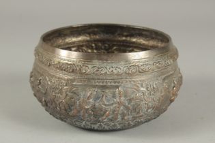 A BURMESE EMBOSSED AND CHASED TINNED COPPER BOWL, relief decorated with various dancing figures,