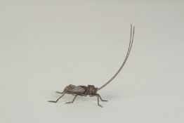 AN ARTICULATED JAPANESE BRONZE OKIMONO OF A CRICKET, 7.5cm long.