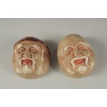 TWO ANTIQUE JAPANESE POTTERY FACE SAKE CUPS, 5cm and 5.5cm wide, (2).