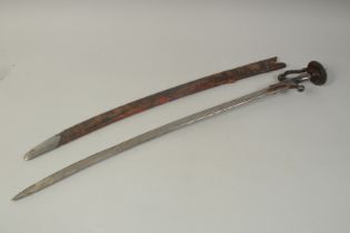 A 19TH CENTURY INDIAN TULWAR, with fine blade - probably Damascus, with original scabbard, 89.5cm